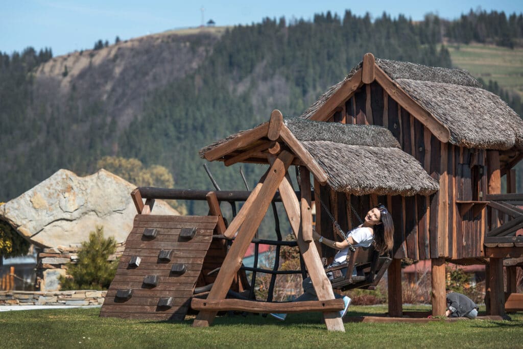 Swings and climbing features in the playground