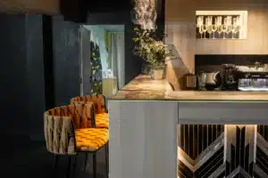 The bar interior and upholstered armchairs